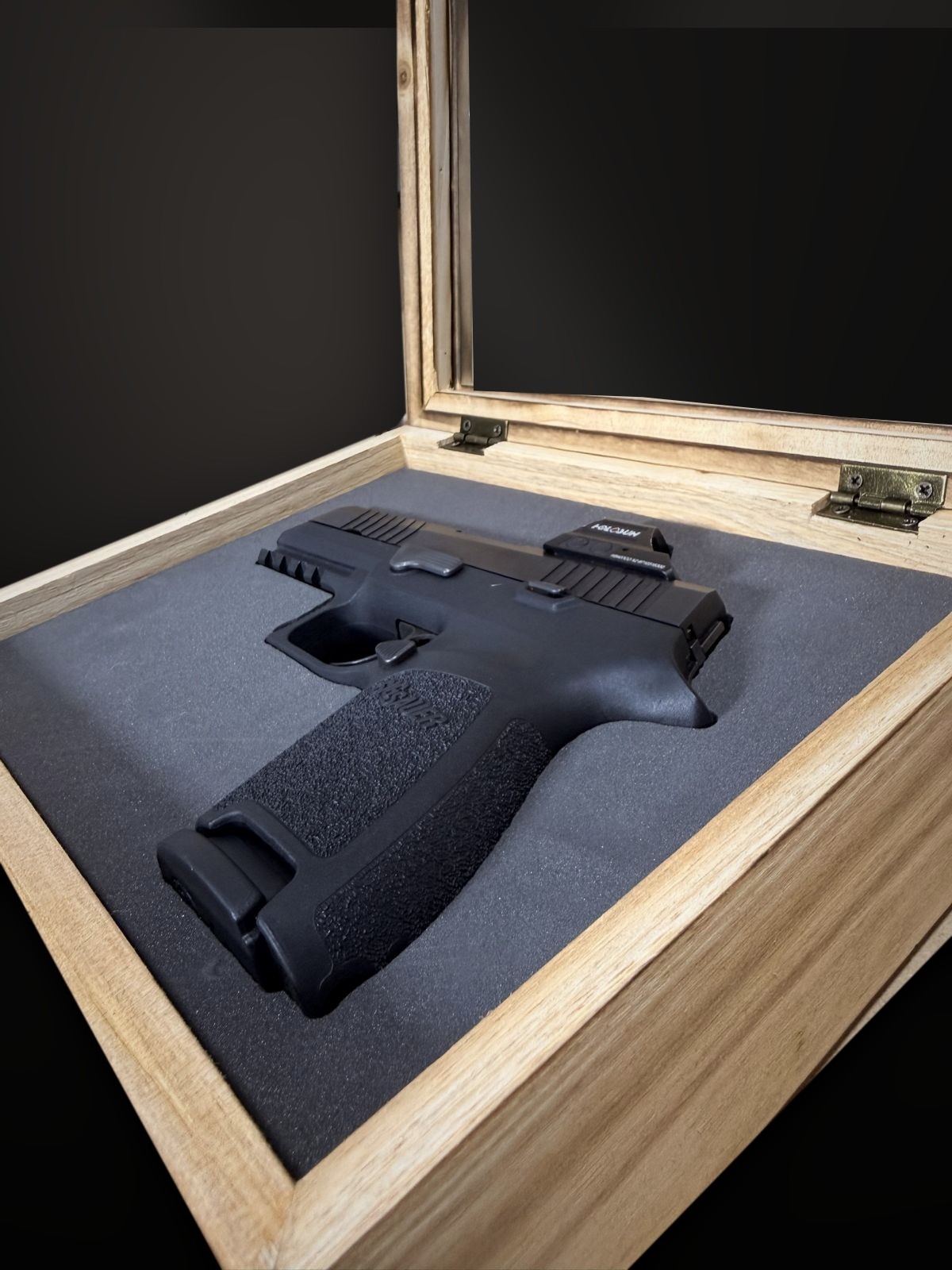 P320 in a foam insert with the case lid open
