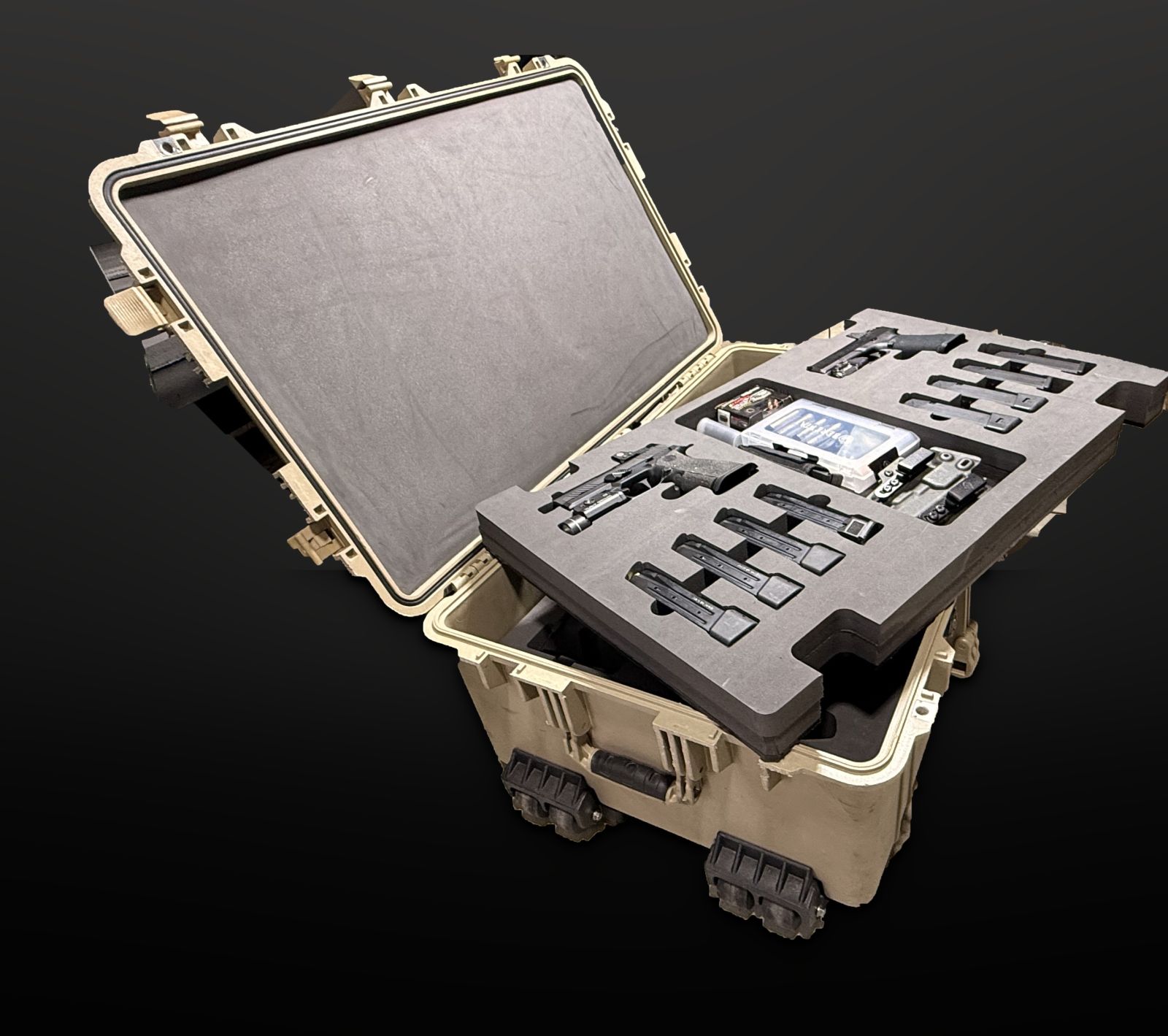 Pelican hard case with custom foam layers holding pistols, magazines and accessories